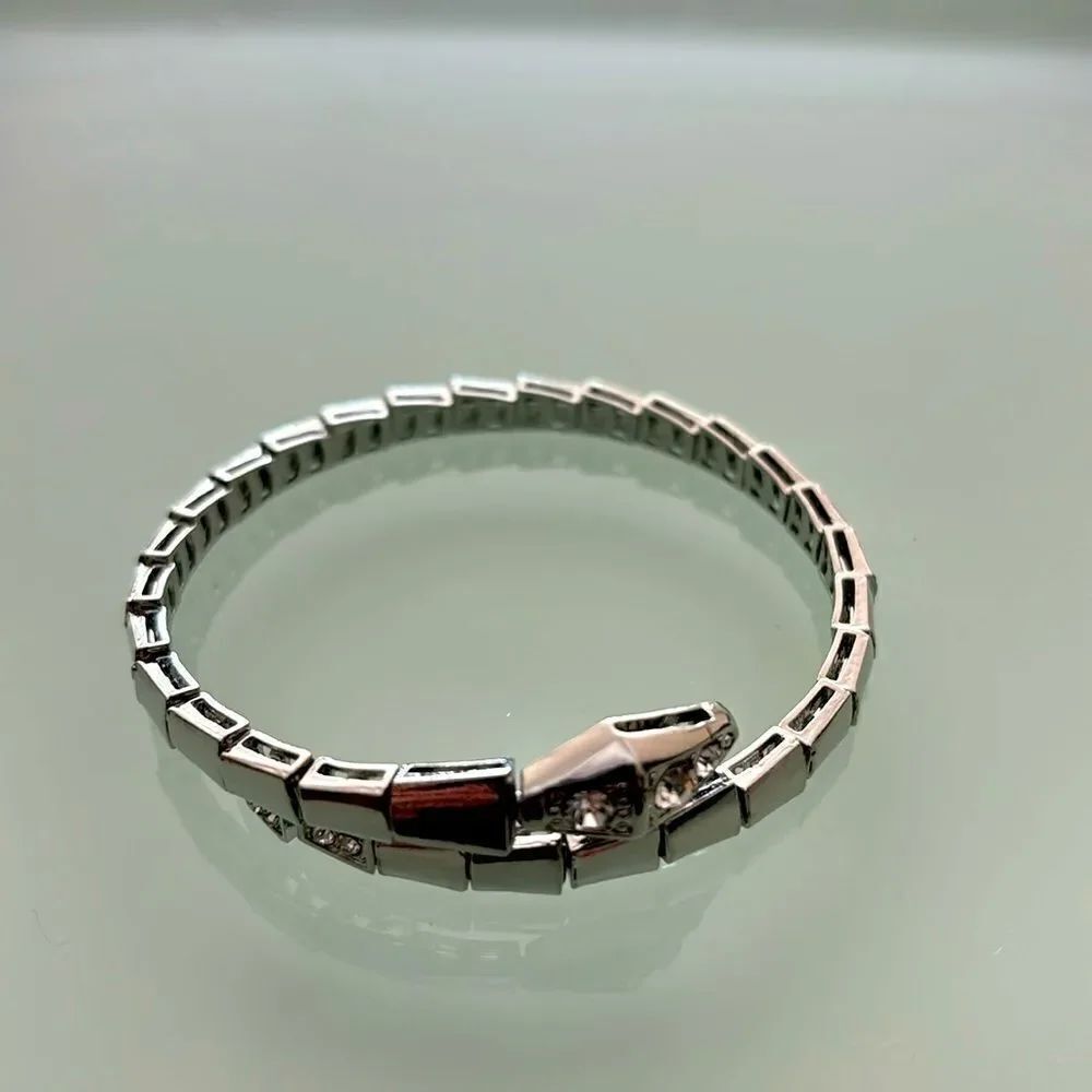 Snake bracelet silver color stones on snake head and tail very stretchable